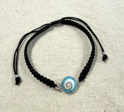 Bracelet Oeil de Sainte Lucie et Turquoise sur Cordon. 